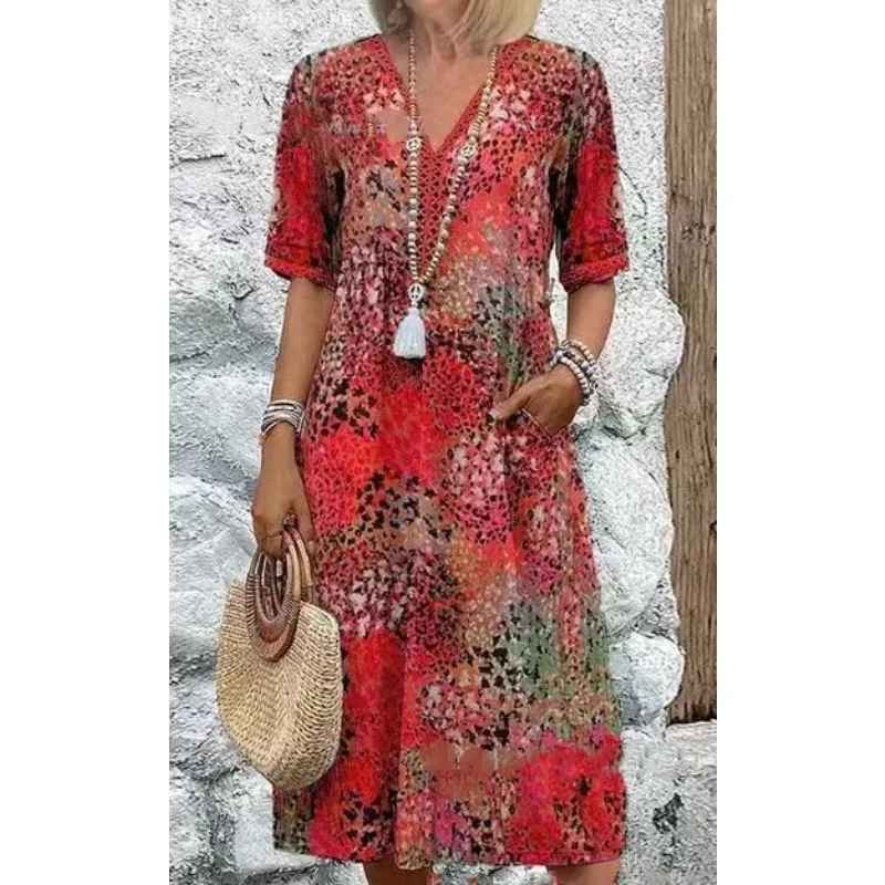 IRIS-Abito leggero e fluido dal taglio che valorizza la figura